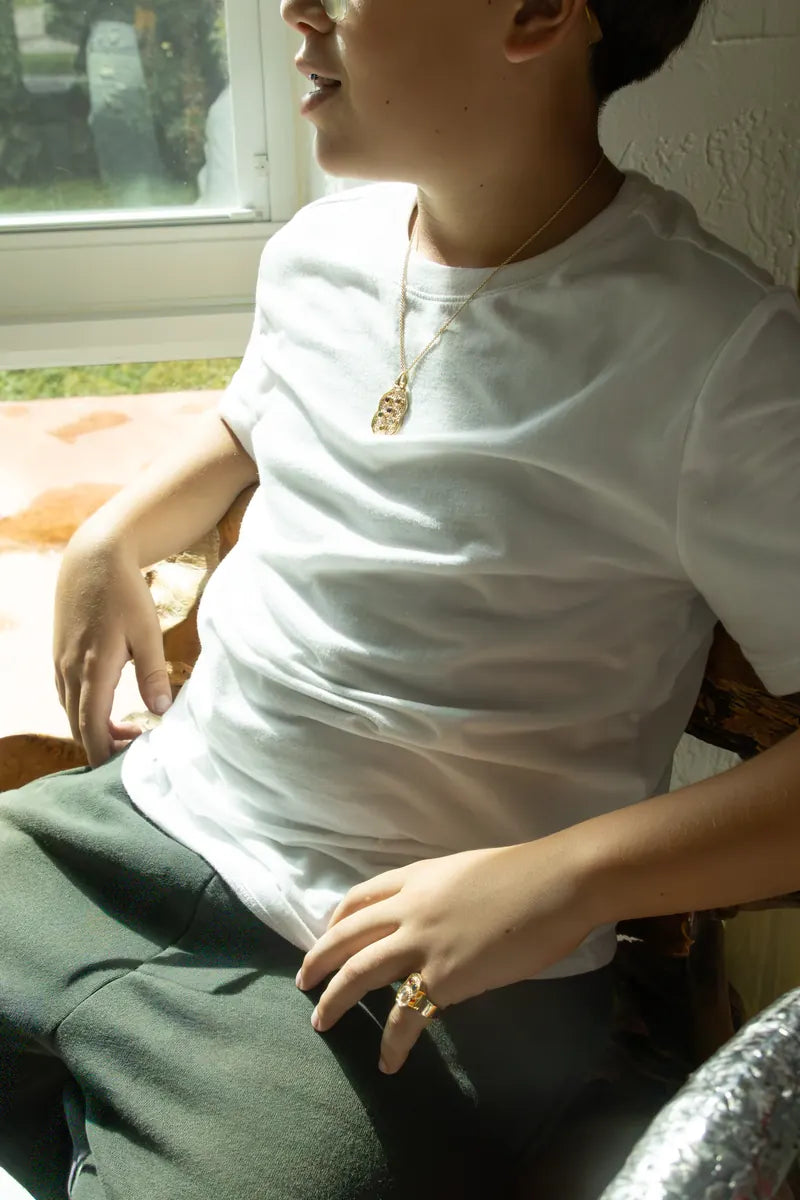 The Nugget Pendant worn with a white T-shirt